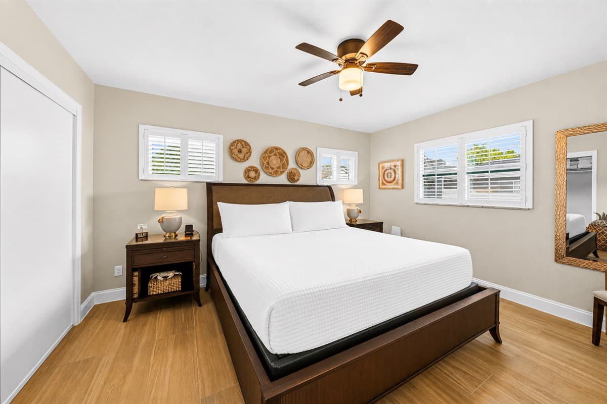 Cozy and beautifully designed bedroom featuring a comfortable king-size bed and calming décor.