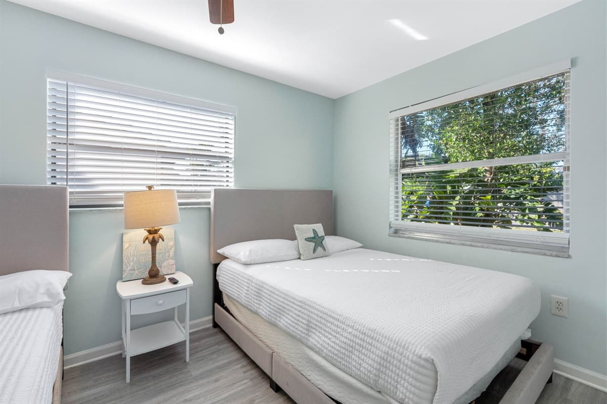 This bedroom is designed with comfort and convenience in mind, making it an excellent choice for larger groups or families traveling with children.