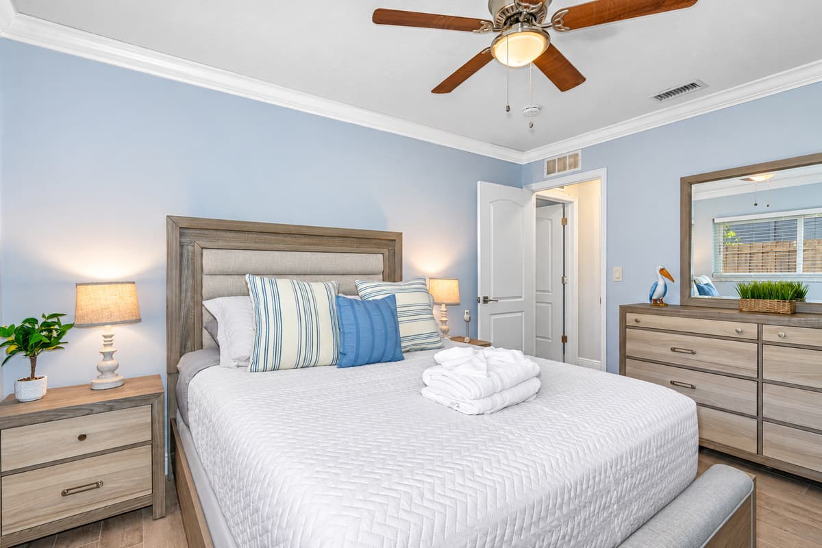 This bedroom is a haven of tranquility designed to offer you restful nights and a peaceful retreat.