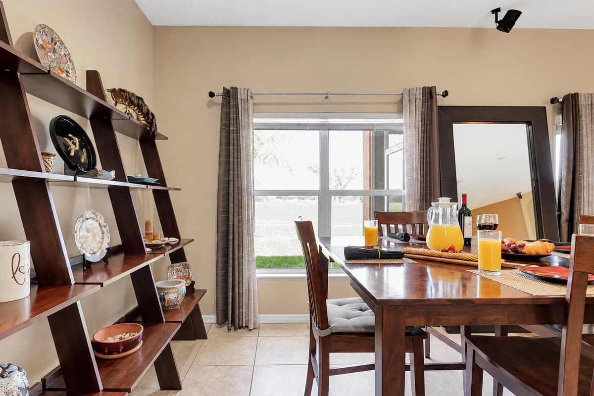 As you savor your culinary creations, bask in the abundant natural light that floods the room, creating an enchanting ambiance for your dining pleasure.