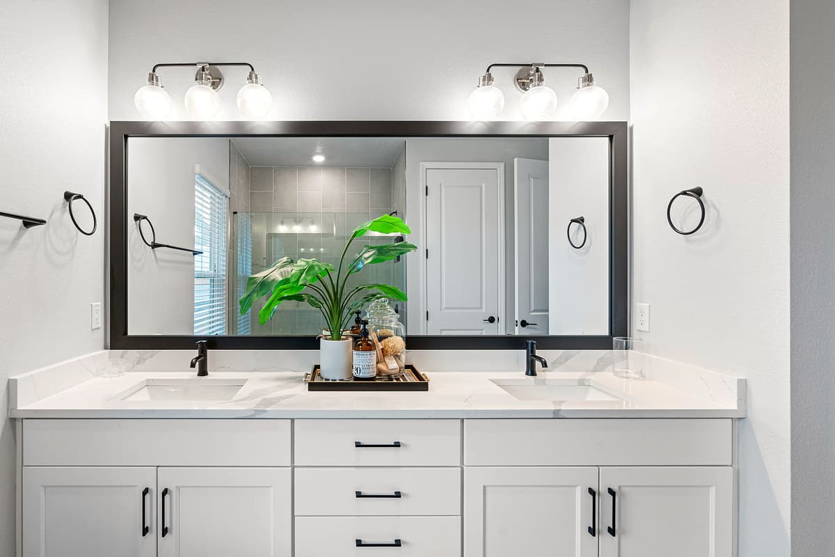 Study in modern elegance, with sleek lines, contemporary fixtures, and luxurious finishes that create a sense of timeless sophistication.