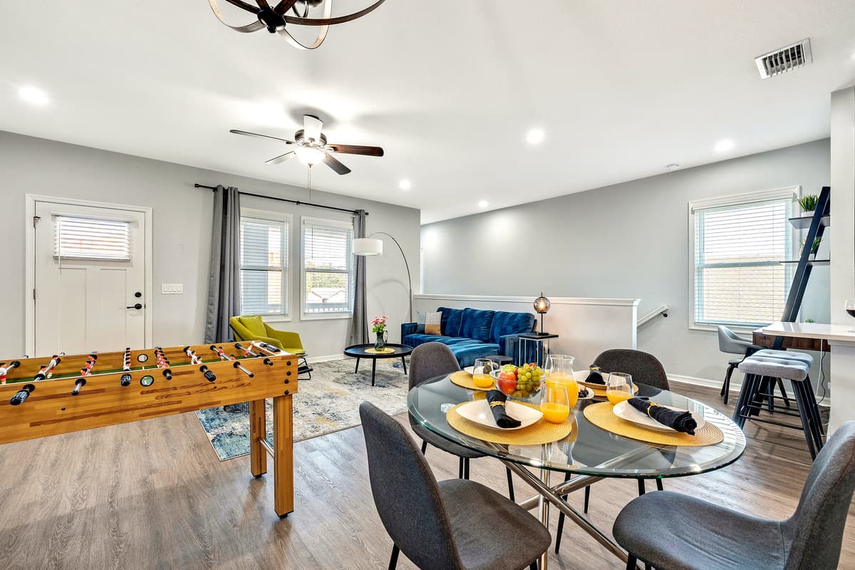 The attention to detail extends beyond the table, with subtle decor elements adding to the overall charm of the room.