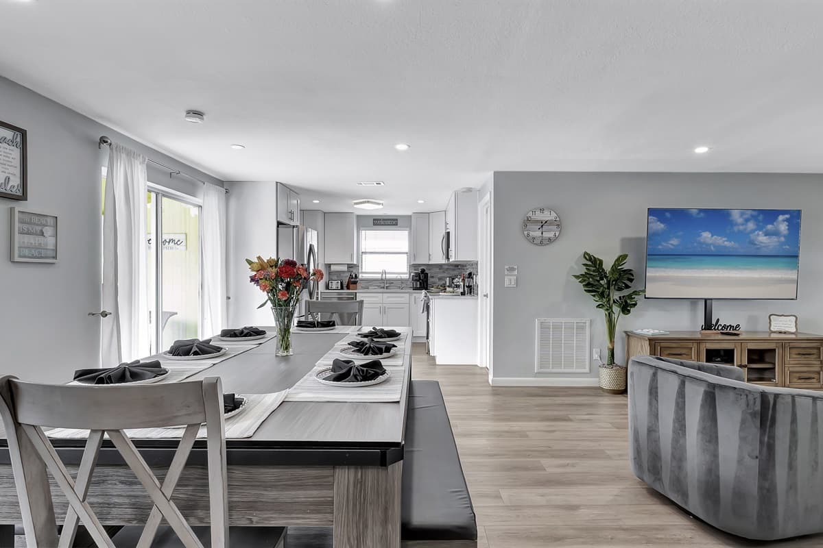 Gather around a spacious dining table that comfortably seats eight for a memorable meal together.