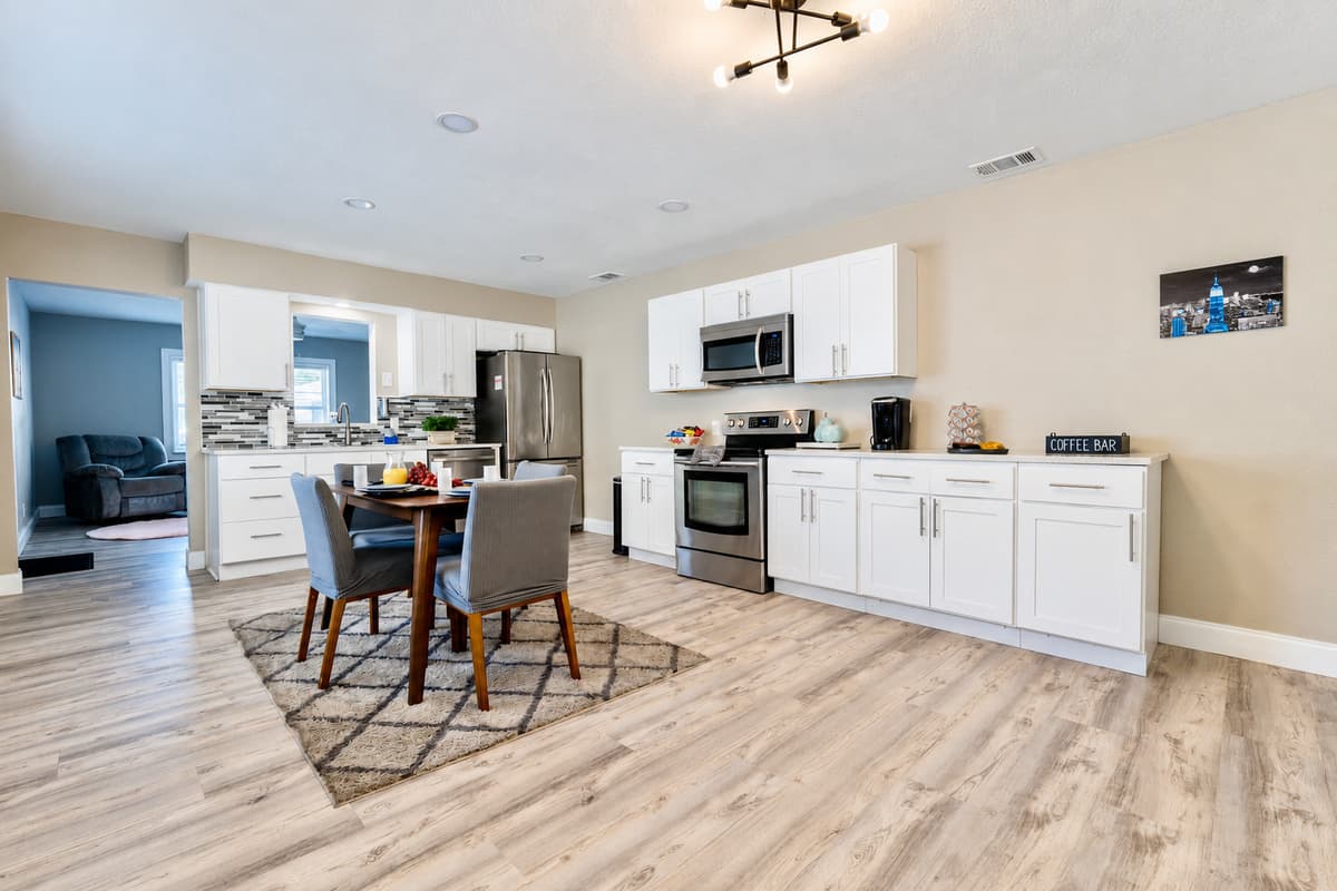 The dining area's proximity to the kitchen ensures that culinary delights are easily shared and savored.