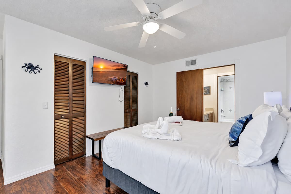 Soft lighting and tasteful decor complete the luxurious feel of this bedroom, making it a serene haven where you can escape from the world.