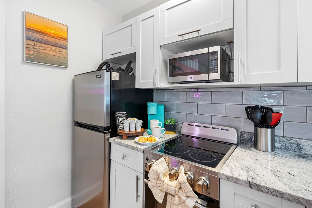 As you step into this chic retreat, you're immediately greeted by a burst of color and a sense of contemporary glamour.
