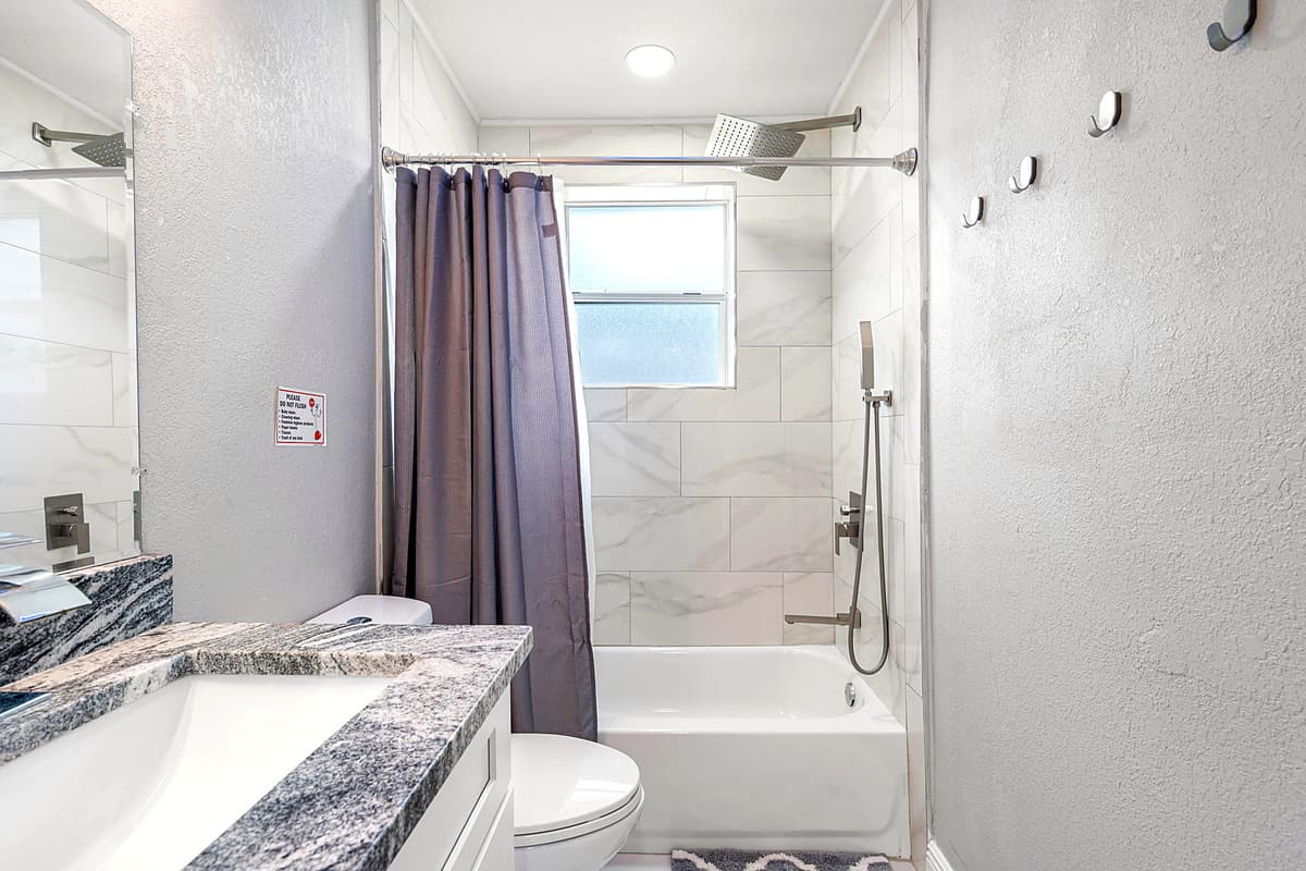 Step into a sanctuary of relaxation and rejuvenation in our elegantly designed bathroom.
