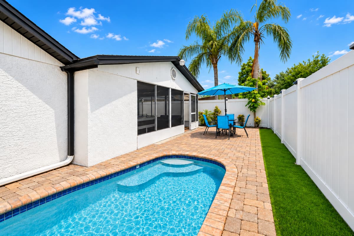 Refreshing pool area with ample space for swimming, lounging, and enjoying sunny Florida days in your own private oasis.