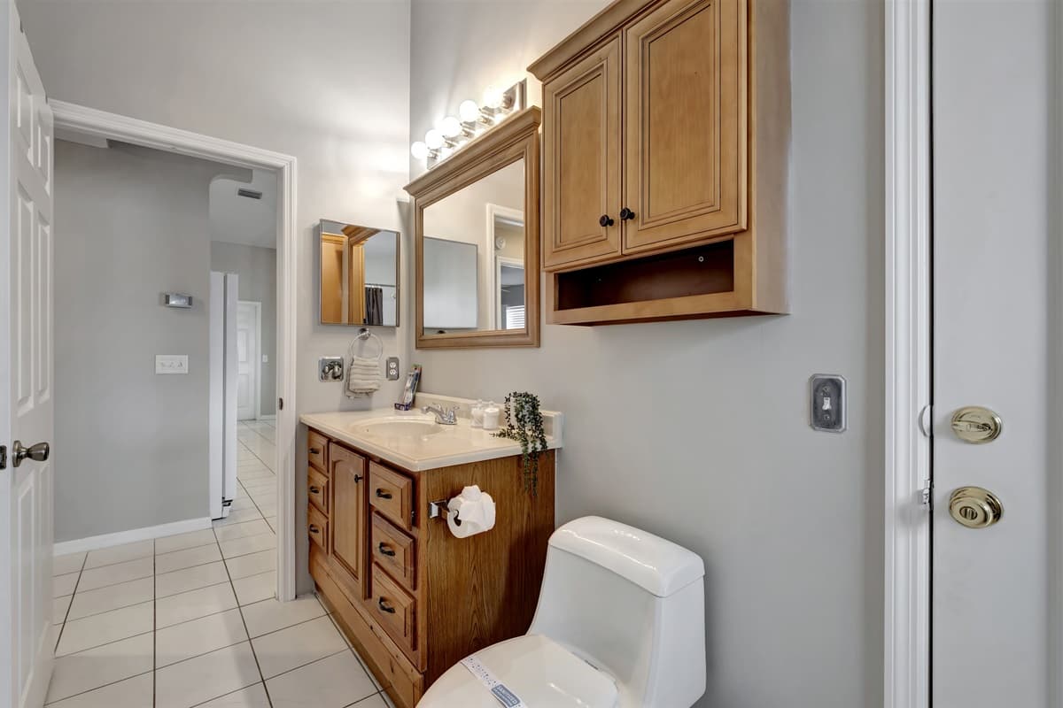 As you step into our enticing bathroom, you are enveloped in an atmosphere of tranquility and luxury.