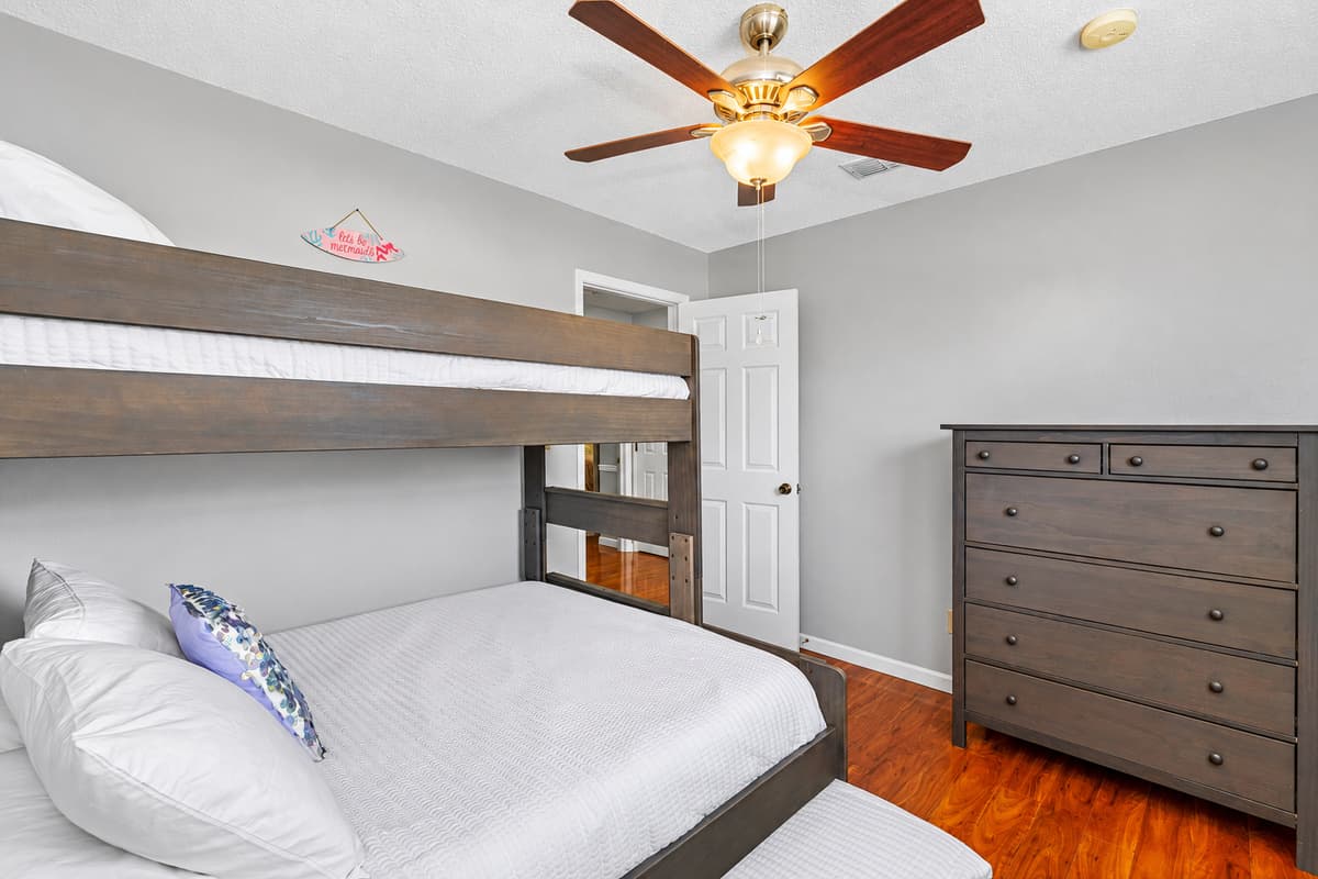Twin XL over Queen bunk with Twin XL trundle — ideal for a small family or kids sharing a room.