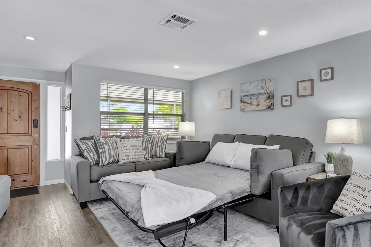 Our plush couch offers a versatile sleeping solution as it can easily transform into a comfortable sofa bed.