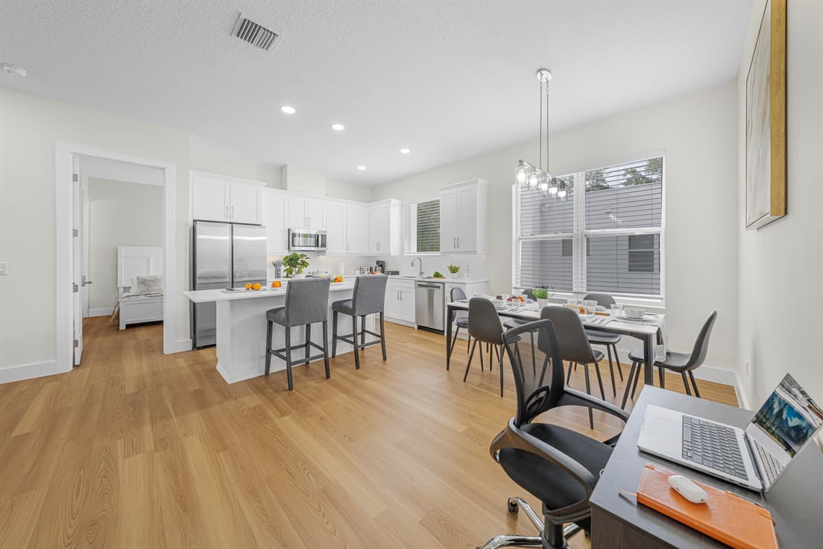 Cook, dine, and work — all in one gorgeous space. The dedicated work desk with a laptop-ready setup is perfect for remote workers.