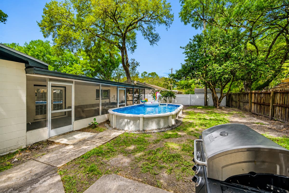 Lovely backyard with comfortable sitting area and griller. Enjoy good food while bonding with family and friends without worrying about the cold weather. If you like this property, send us an inquiry now!