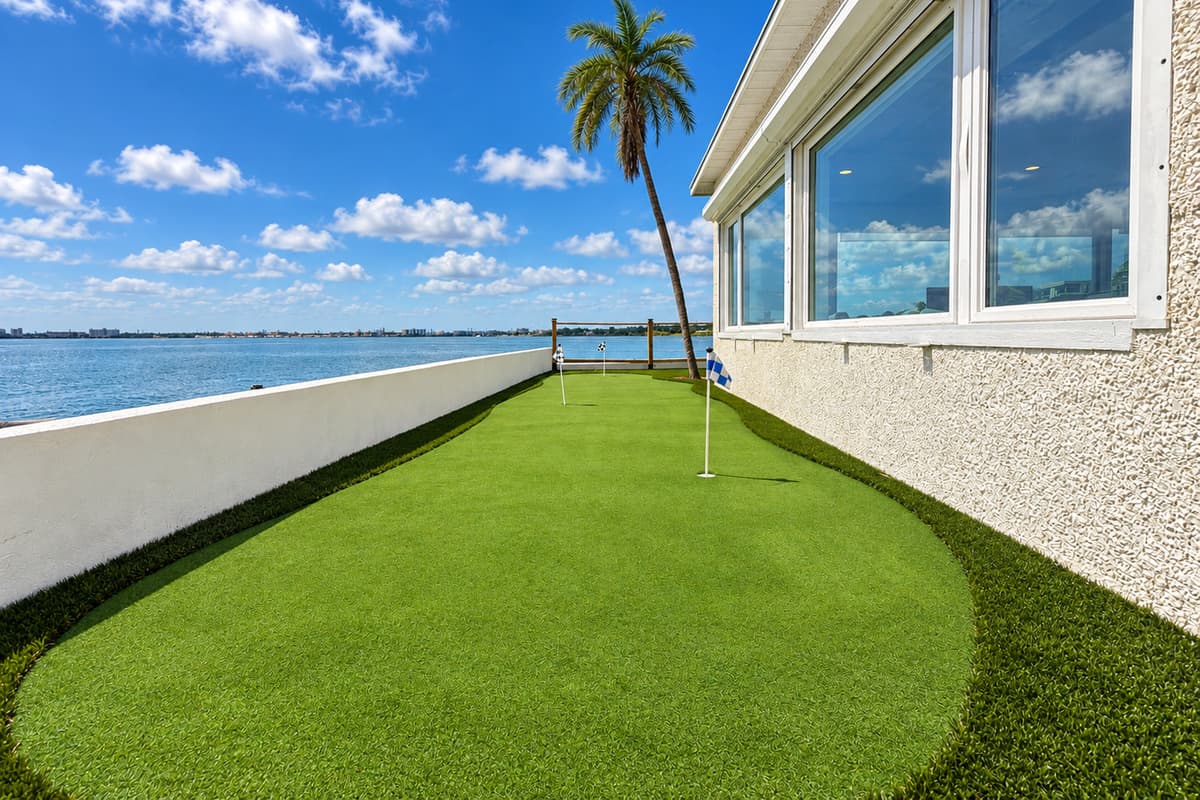 Private putting green beside the waterfront.