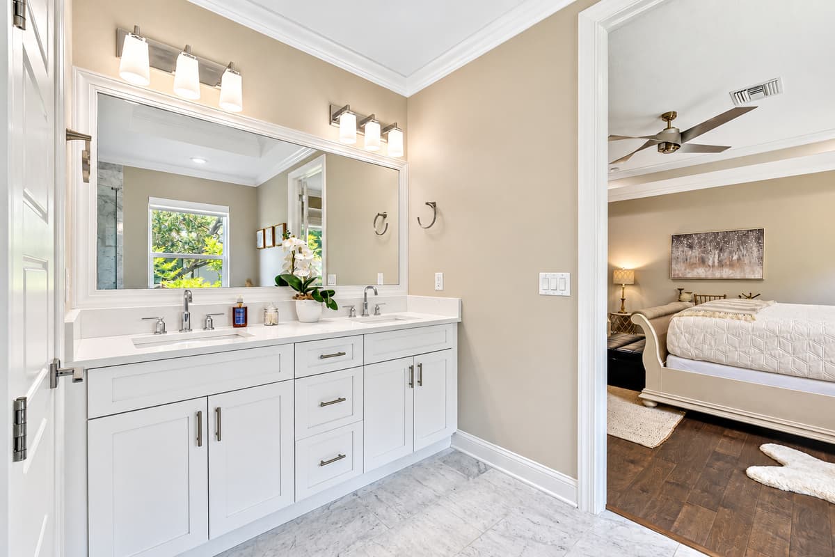 Located in the back unit for added convenience, This bathroom mirrors the elegance and functionality of its counterpart, providing guests with a serene and stylish space to unwind and refresh.