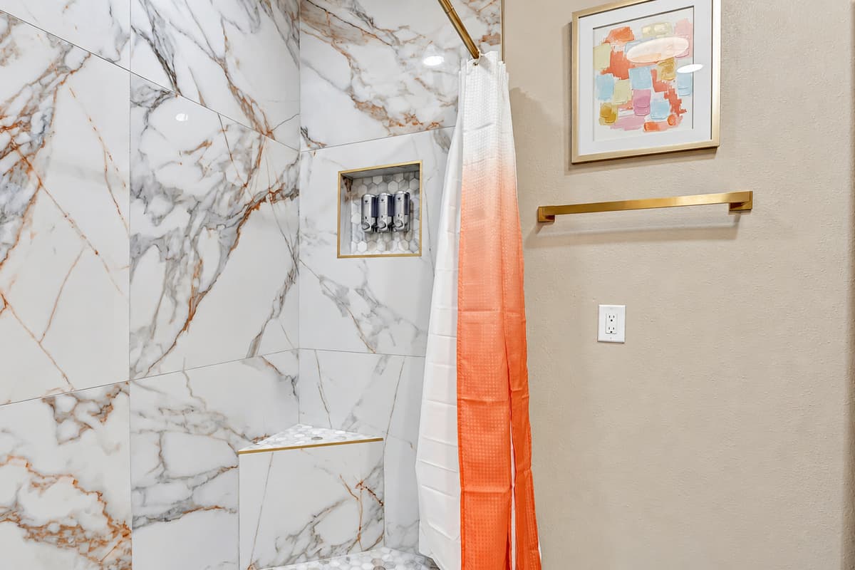 Step into our spacious walk-in shower and let cascading water envelop you in relaxation, making every shower a spa-like experience.