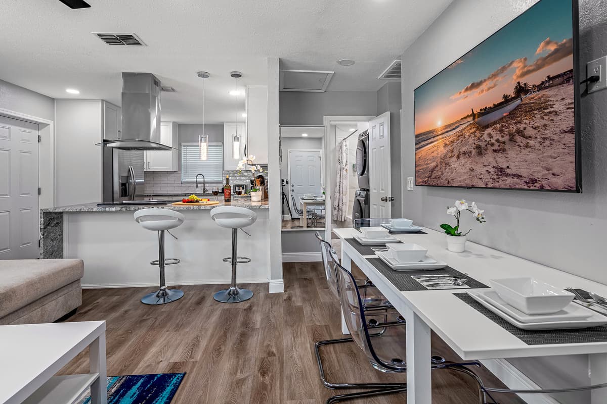 Who wouldn't love the open concept of our beautiful dining area and modern fully equipped kitchen. Cherish wonderful memories with family and friends while on vacation.