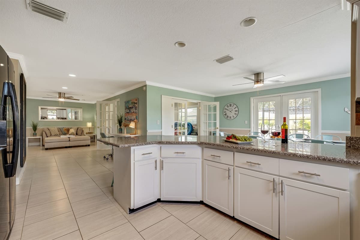 Step into the heart of our home, the kitchen, where culinary dreams come to life and family moments are savored.