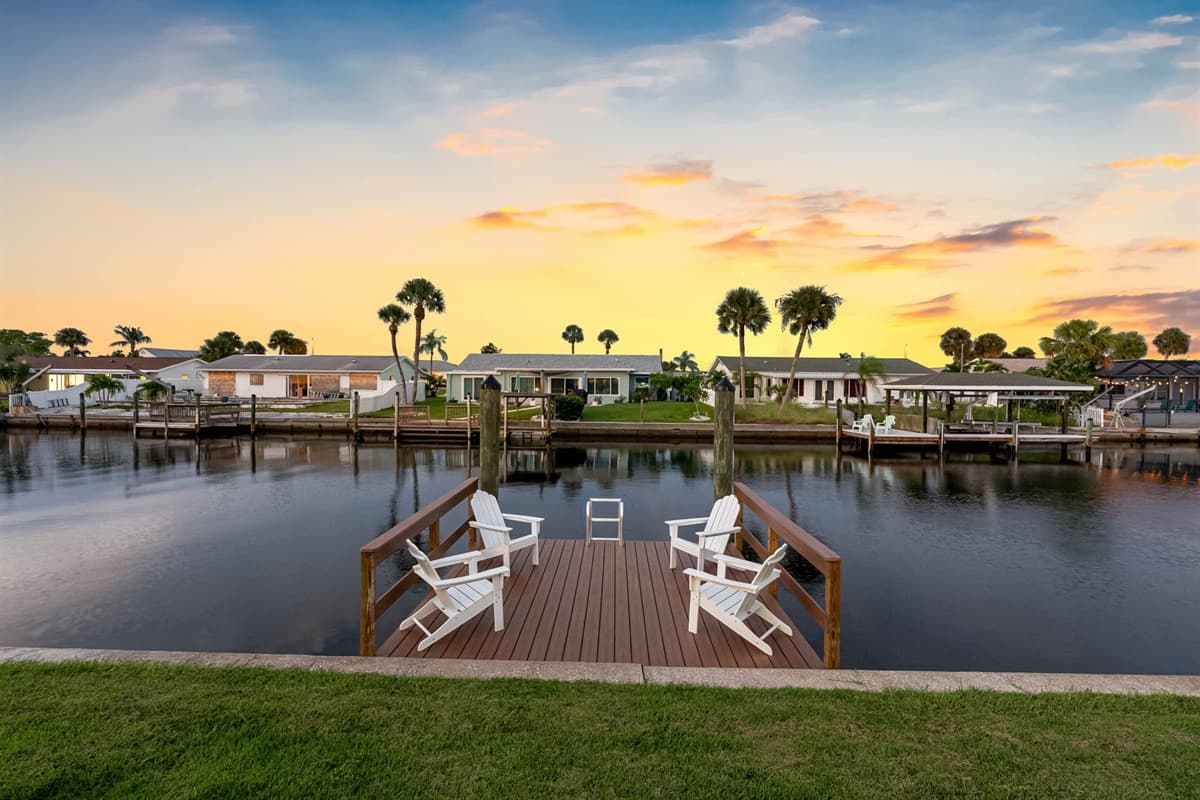 Four Adirondack chairs offer the perfect spot for quiet reflection or friendly conversation.