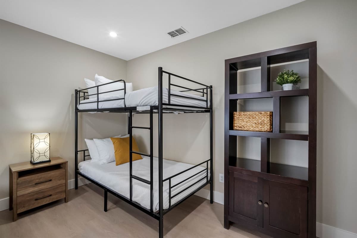 Thoughtfully designed with two bunk beds, this spacious room ensures everyone has a comfortable spot to rest after a day of Florida fun.