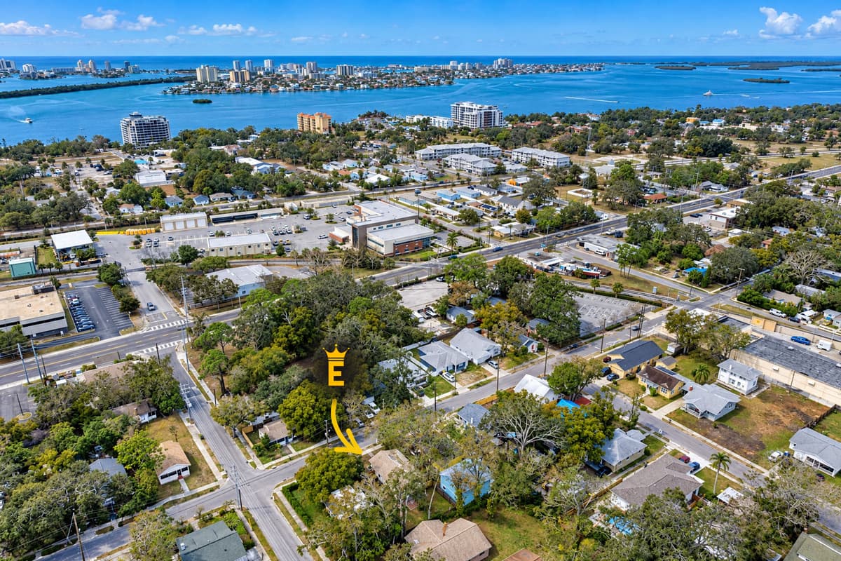 The Gulf is eight minutes from the tagged roof. Clearwater Beach sits 2.5 miles west, Pier 60 and the Marine Aquarium just past it. The Pinellas Trail runs by the block, so you can bike to Dunedin at dawn and still hit sand by noon.