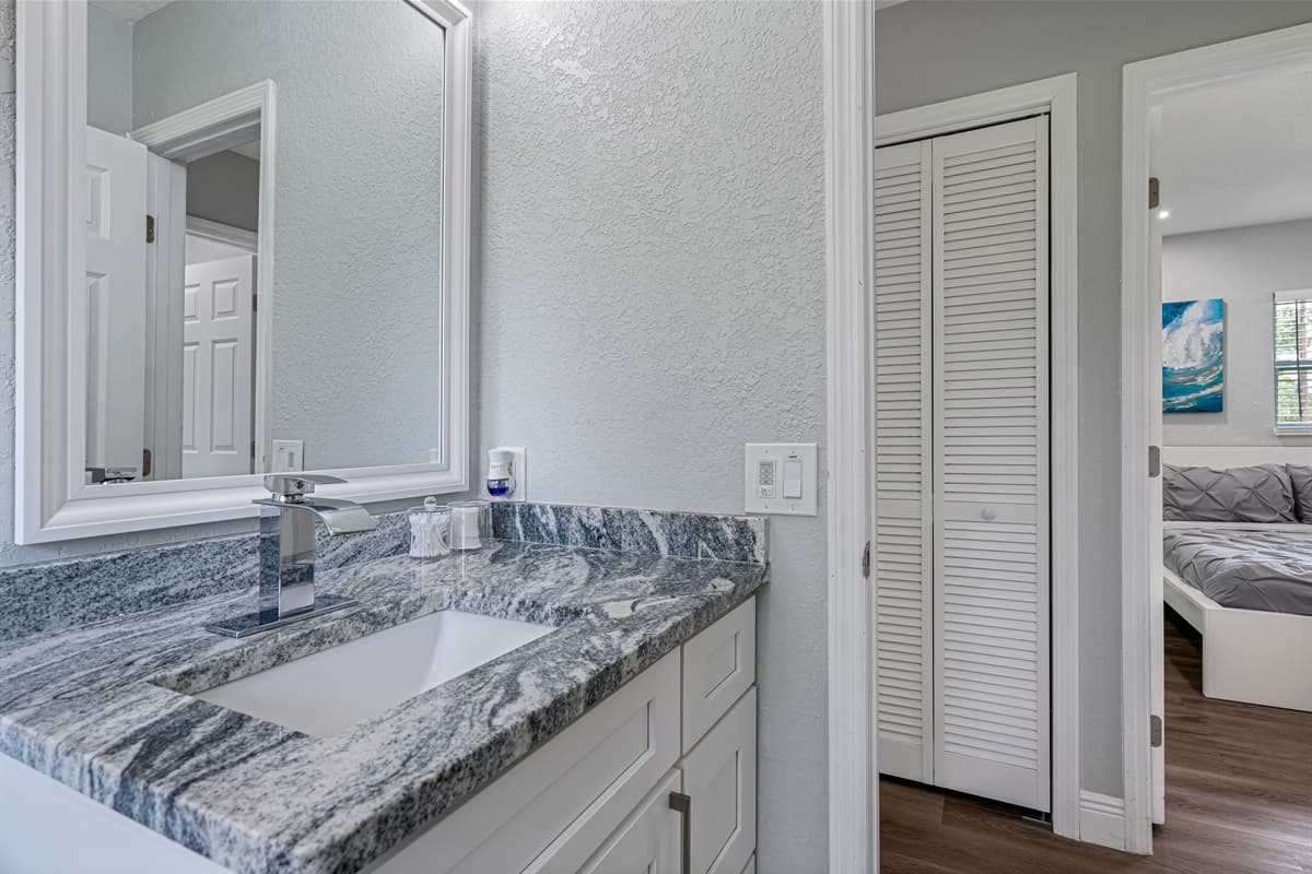 This impeccable bathroom has toilet, sink, bathtub and shower. Feel fresh and clean after a long day of travel from your home to your home away from home. If you are interested in this property, book it now!