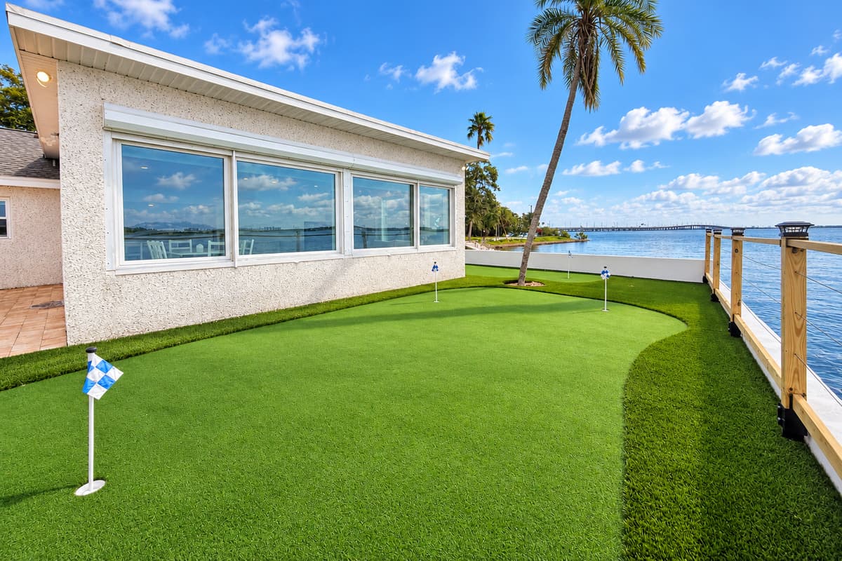 Private putting green beside the waterfront.