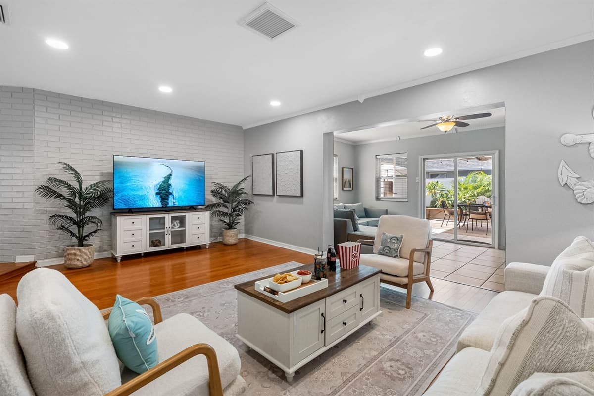 Catch up on your favorite shows on the smart TV or enjoy conversation in this beautifully designed open-concept living space.