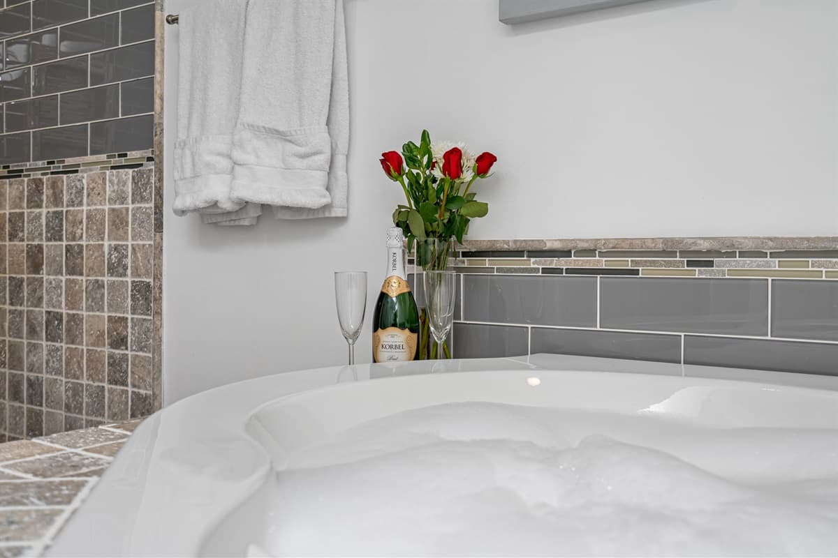 Experience the ultimate in pampering and create your own personal oasis of serenity with our breathtaking bathroom and hot tub.