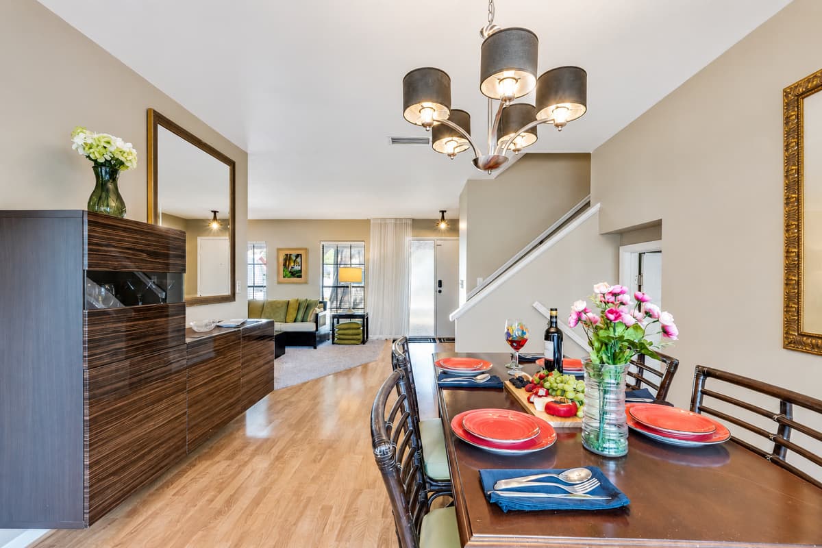 Our dining table fronting the large window sets the stage for unforgettable dining experiences.