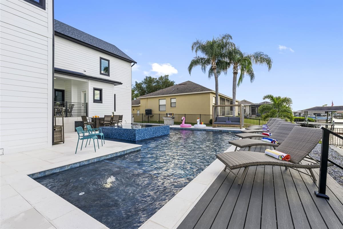 The sparkling, well-maintained pool invites you to cool off during the day or unwind by the water as the sun sets.