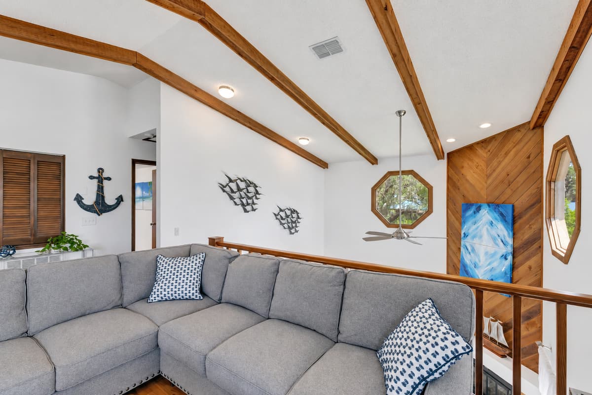 Whether you seek solace in a captivating novel, indulge in a leisurely afternoon nap, or simply bask in the tranquility of the surroundings, this inviting day bed offers the perfect retreat.