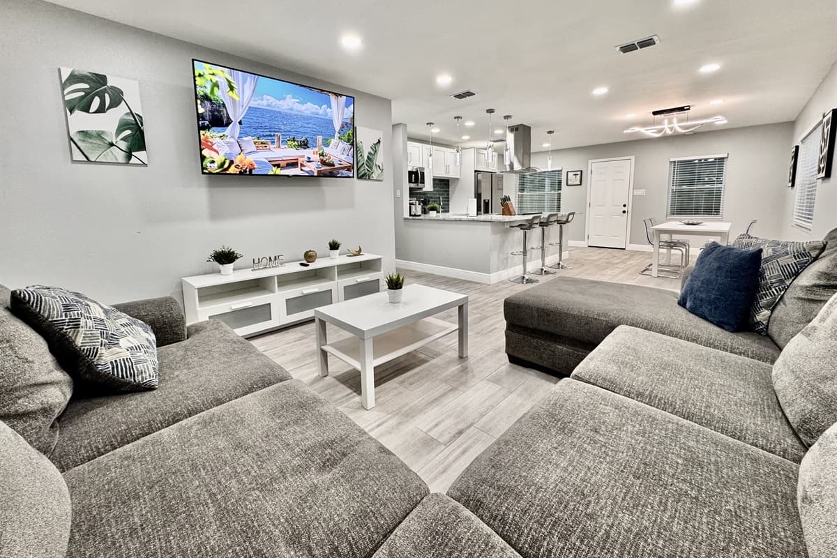 This spacious living room is thoughtfully designed to cater to your every need, whether you’re unwinding after a day of exploring Tampa, hosting a movie night, or simply enjoying quality time with loved ones.