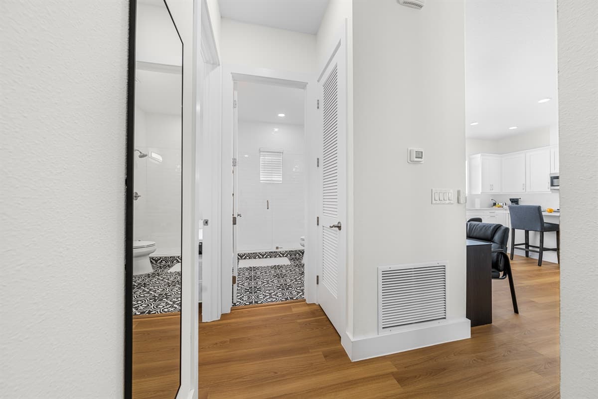Full shower-tub combo with fresh towels provided — everything you need for a comfortable stay.