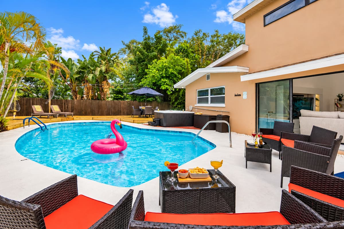 This backyard paradise is the heart of the home—designed for entertaining, relaxing, and soaking up the Florida sunshine.
