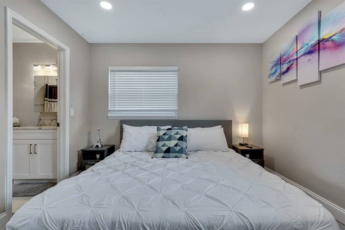 Want your own space during this trip? This room has a king-size bed, its own bathroom, cabinets, and its own TV. Who wouldn't want a comfortable room to rest in after a long day? If you like what you see so far, send us a message as soon as possible!