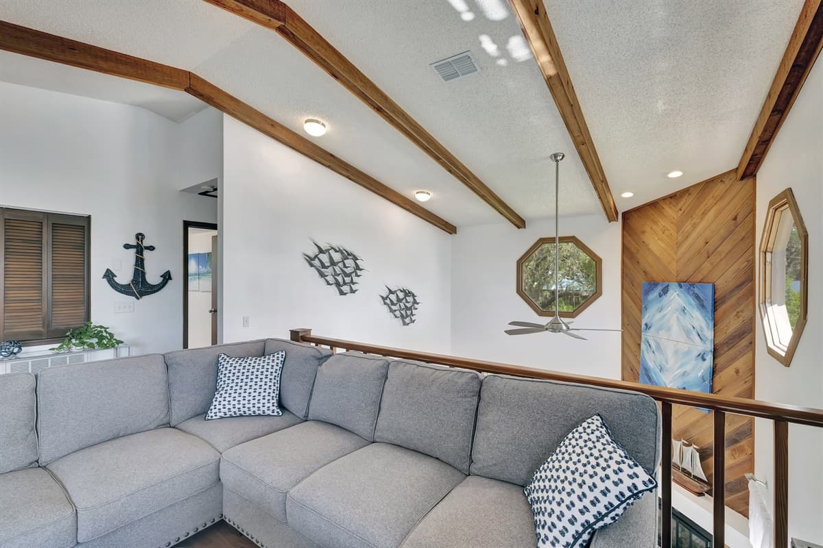 Whether you seek solace in a captivating novel, indulge in a leisurely afternoon nap, or simply bask in the tranquility of the surroundings, this inviting day bed offers the perfect retreat.