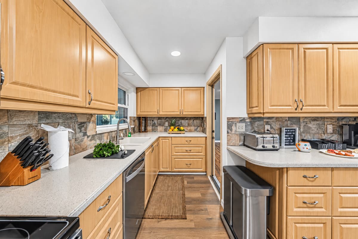 Fully equipped kitchen with generous cabinetry and everything needed for a comfortable stay 
