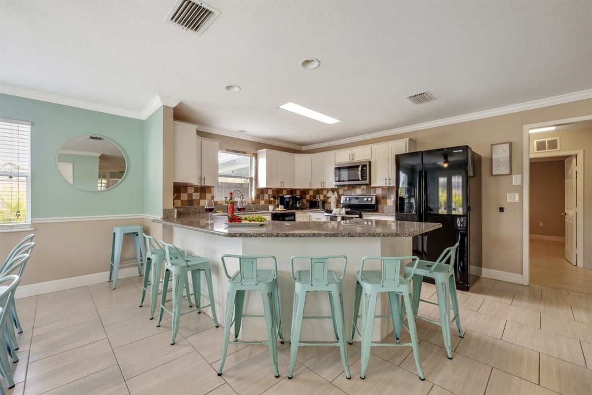 Surrounded by comfortable chairs that invite you to savor delicious meals and engage in heartwarming conversations.