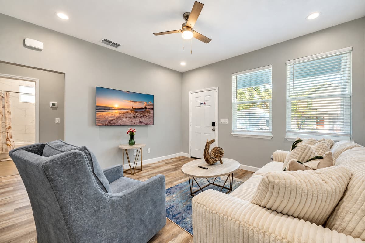 Surrounding the sofa are several comfortable couches and armchairs, each offering its own unique charm and allure.