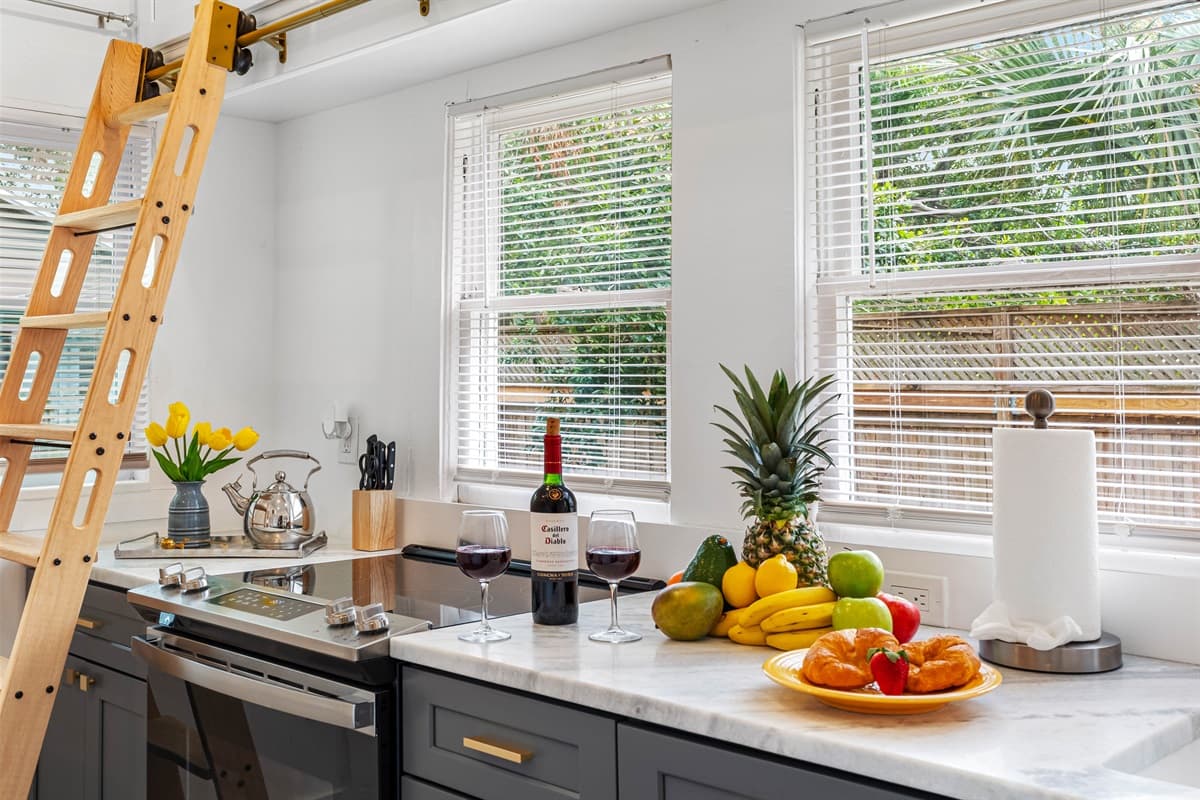 There are plenty of storage options throughout the kitchen, from roomy cabinets for your cookware to shelves for dry ingredients.