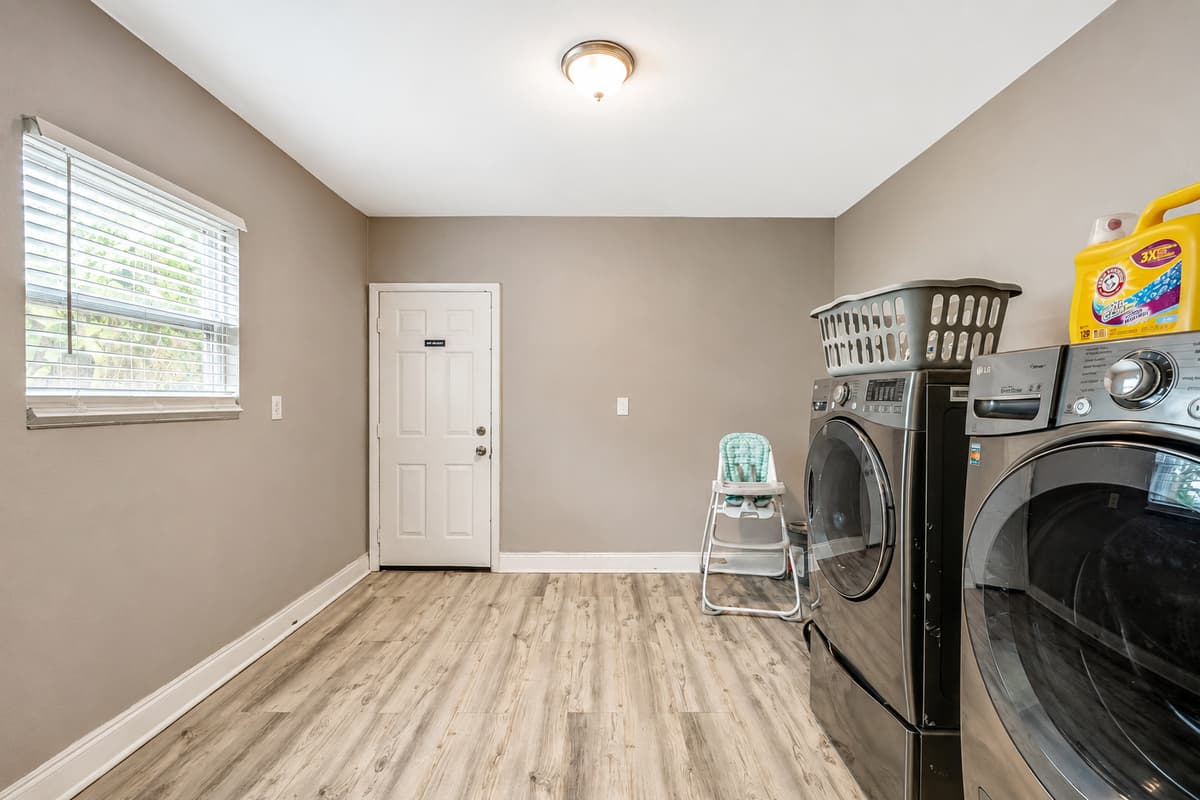 Modern appliances stand tall, ready to tackle the demands of daily laundry.