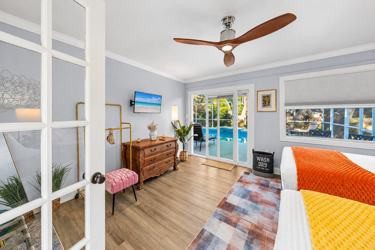This welcoming bedroom is outfitted with two double beds and soft bedding for a comfortable stay.