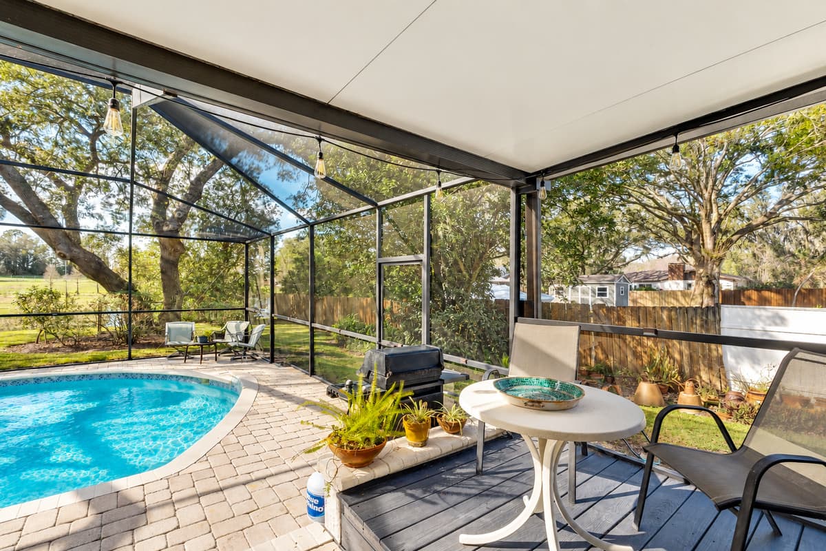 Open to the gentle caress of the breeze, this inviting retreat beckons you to relax and indulge in the delights of outdoor living.