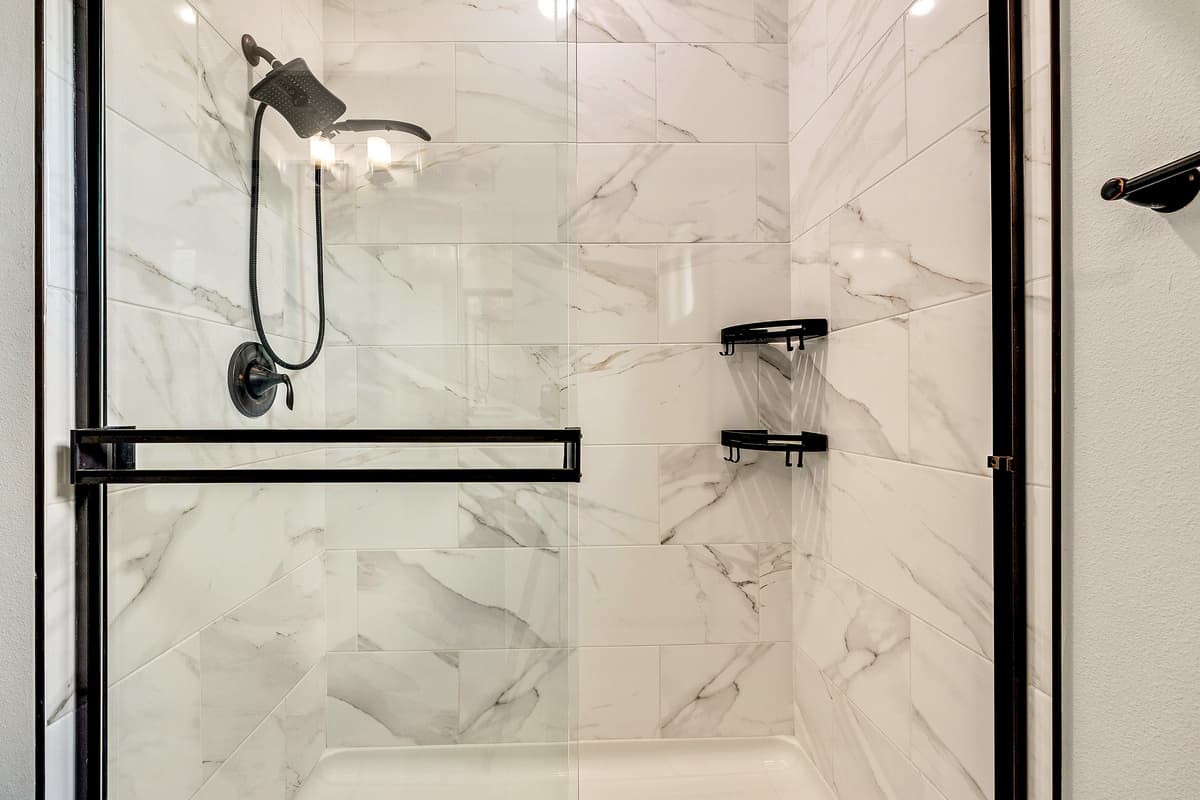 The private ensuite bathroom stands as a testament to exquisite design and seamless functionality.