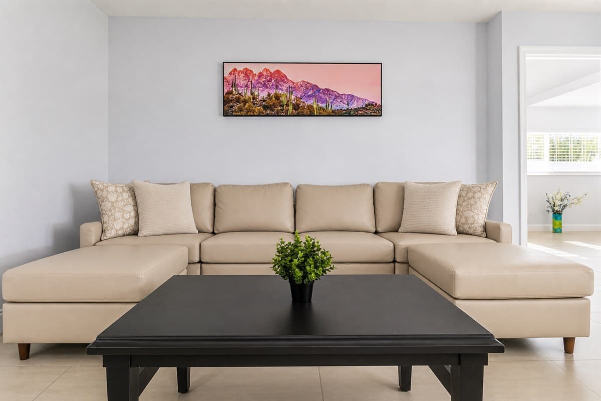 Comfortable lounge area with oversized sectional seating and modern minimalist décor.