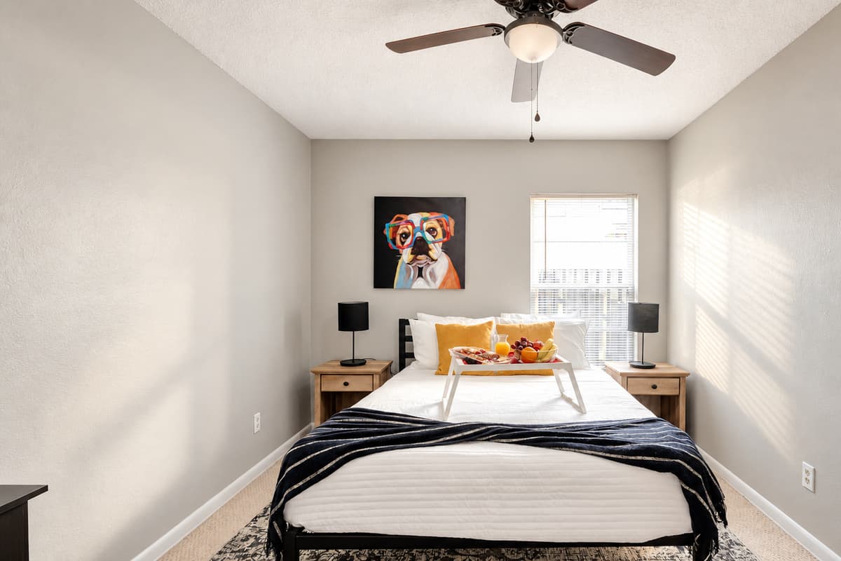 Discover serenity in second bedroom, where comfort meets style.