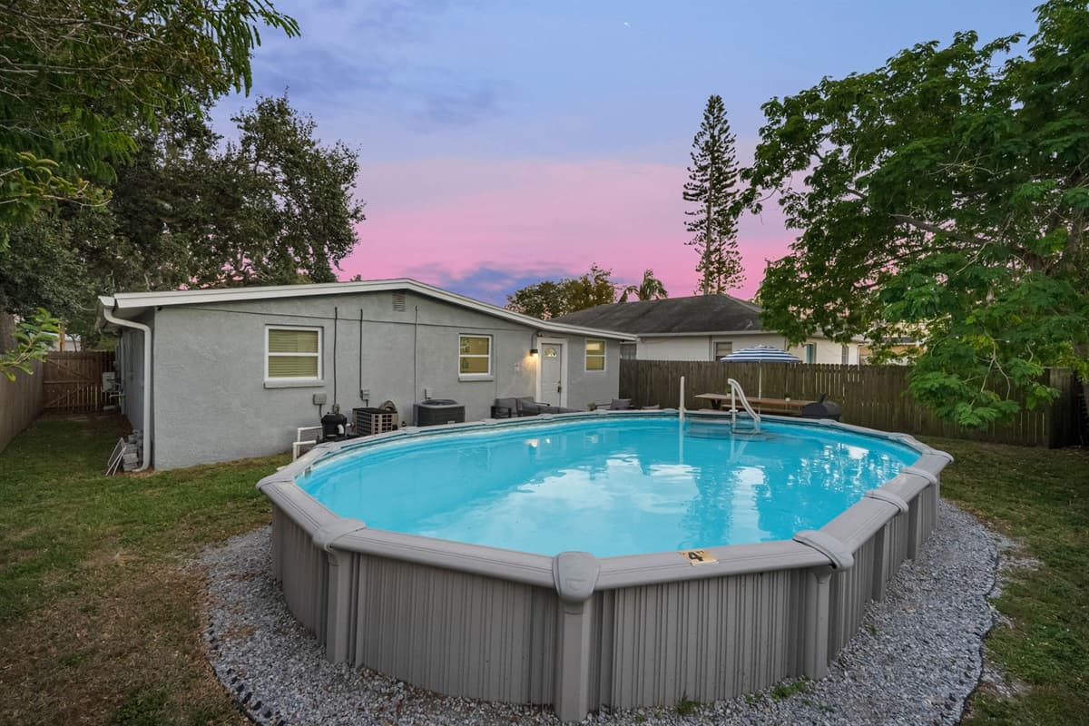 Cool off in the refreshing above-ground pool and soak up the Florida sunshine.