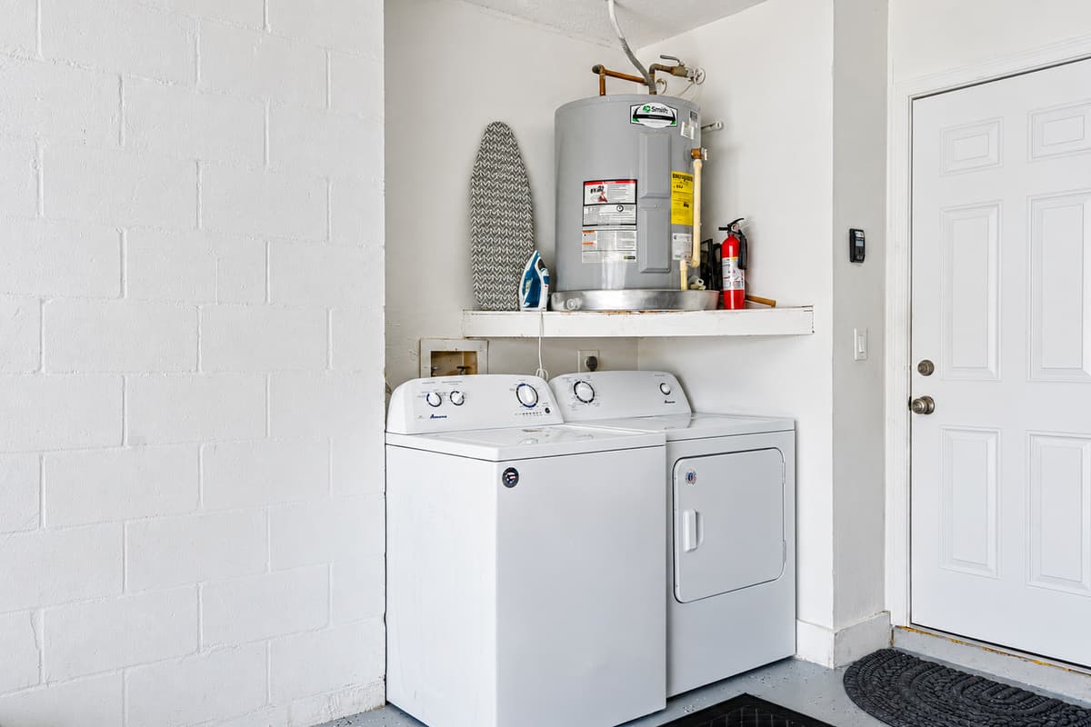 Laundry area, equipped with a washer and dryer.