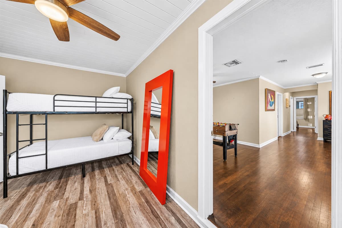Open sleeping area with bunk beds and easy access to main living spaces—great for groups.